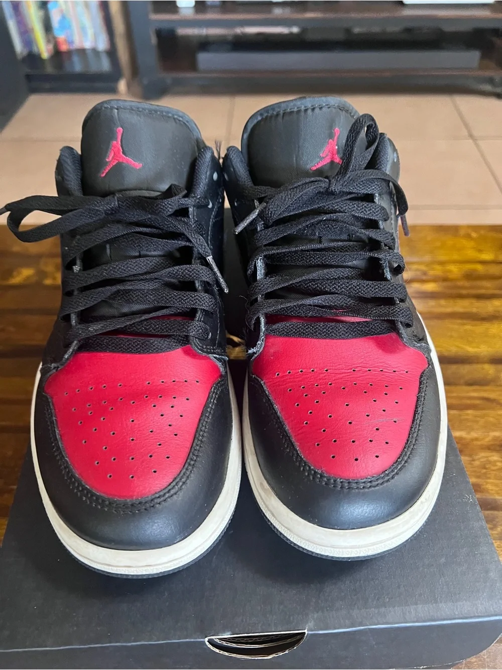 Jordan 1’s High top Sneakers in Black and Red
